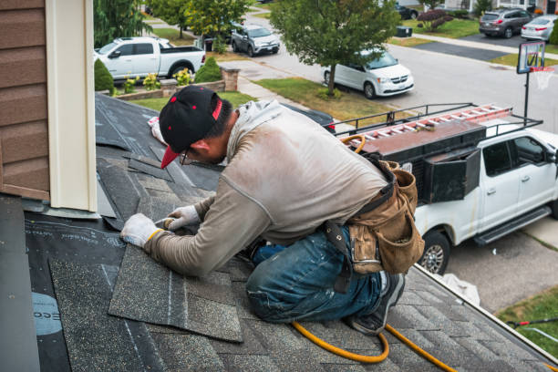 Professional Roofing technician working in Flom, MN